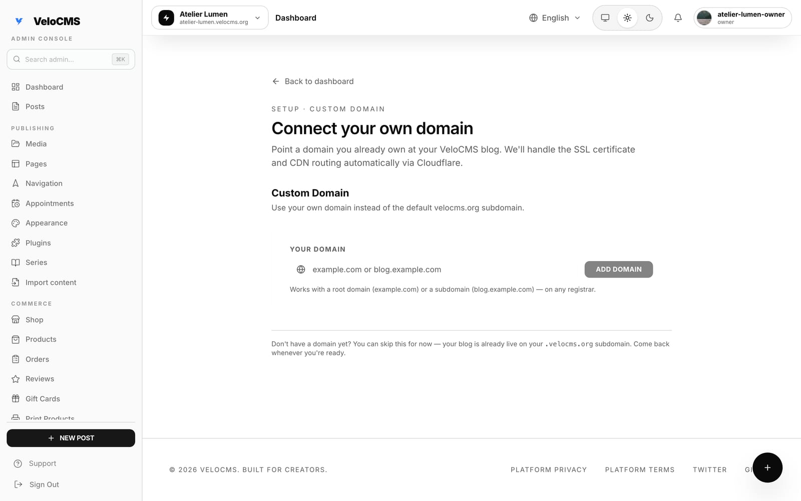 The VeloCMS custom domain setup screen, showing a single domain input field with an Add Domain button and an explanation that SSL and CDN routing are handled automatically